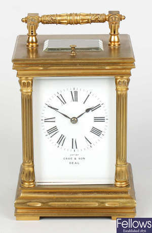 A late 19th century gilt brass repeating carriage clock