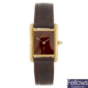 A gold plated quartz lady's Cartier Must de Cartier wrist watch.