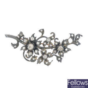 A diamond floral brooch. 