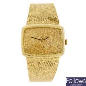 (131147893) A yellow metal manual wind bracelet watch.
