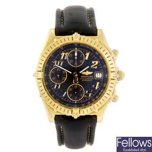 (946001863) An 18k gold automatic chronograph gentleman's Breitling Chronomat Vitesse wrist watch.