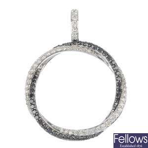 An 18ct gold diamond circle pendant. 