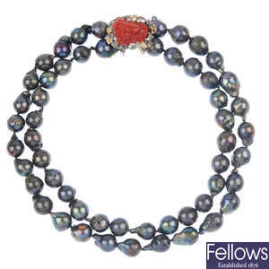 A stained cultured pearl and gem-set two-strand necklace.