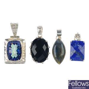 A selection of gem set earrings and pendants.