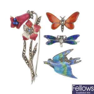 A selection of four early to mid 20th century enamel brooches.