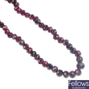 A garnet bead single-strand necklace