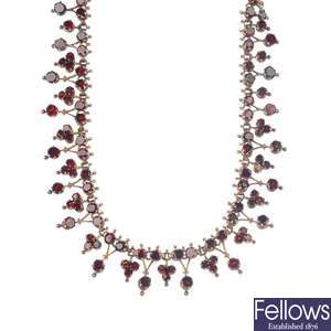 A late 19th century garnet necklace.