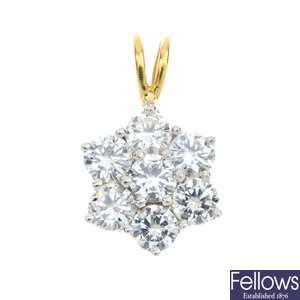 An 18ct gold diamond floral pendant.