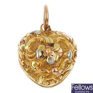 A late 19th century 15ct gold heart-shape locket, with memorial hair panel.