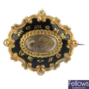 A mid Victorian gold memorial brooch.