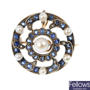 An early 20th century silver and gold, sapphire, diamond and cultured pearl brooch.