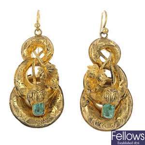 A pair of mid 19th century gold emerald ear pendants. 