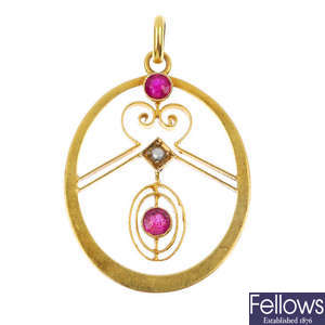 An early 20th century continental  14ct gold ruby and split pearl pendant. 