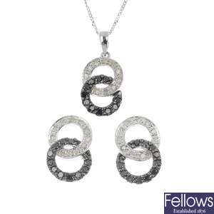 Three sets of 9ct diamond and black-gem earrings and pendants.