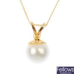 Twelve single cultured pearl pendants with chains.