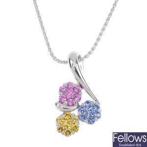 An 18ct gold sapphire cluster pendant.