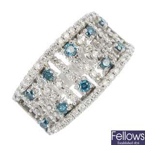 A colour-treated diamond and diamond dress ring.