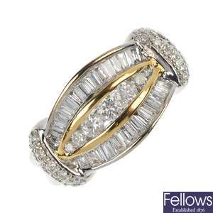 An 18ct gold laser-drilled diamond and diamond dress ring.