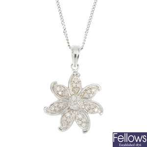 A 9ct gold diamond floral pendant.