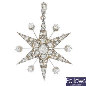 A late 19th century silver and 9ct gold diamond star brooch.
