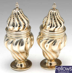 A pair of Victorian silver casters.