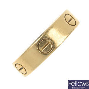 CARTIER - an 18ct gold 'Love' band ring. 