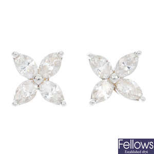 TIFFANY & CO. - a pair of platinum diamond floral ear studs.