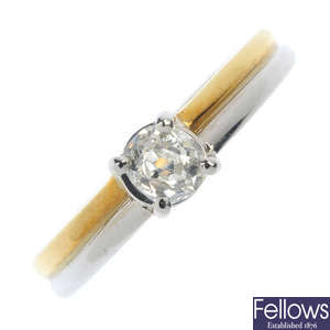 A platinum and 18ct gold diamond single-stone ring.
