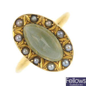 A late 19th century 18ct gold cat's-eye gem and split pearl cluster ring. 