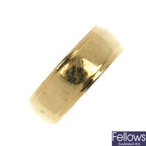 An 18ct gold wide band ring.