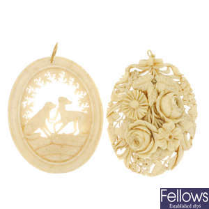 Two late 19th century ivory pendants.