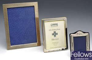 A collection of six modern photo frames including an Italian example.