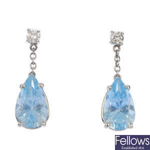 A pair of aquamarine and diamond ear pendants.