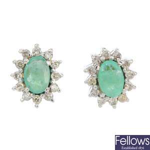 A set of emerald and diamond jewellery.
