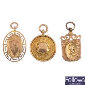 A selection of three early 20th century 9ct gold fob medallions. 