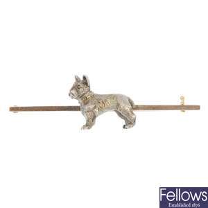 A mid 20th century silver and 9ct gold Pit Bull Terrier bar brooch.