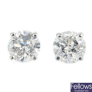 A pair of 9ct gold brilliant-cut diamond ear studs.