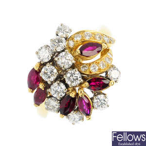 An 18ct gold diamond and garnet dress ring.