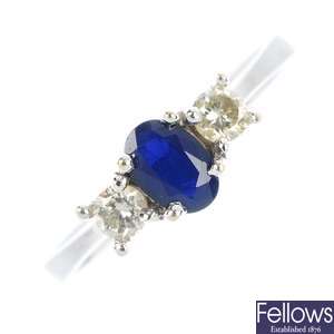  An 18ct gold sapphire and diamond three-stone ring.