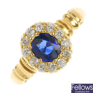 An Edwardian 18ct gold sapphire and diamond cluster ring.