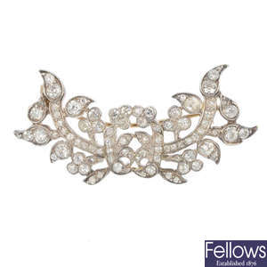 An early 20th century continental silver and gold diamond floral brooch.