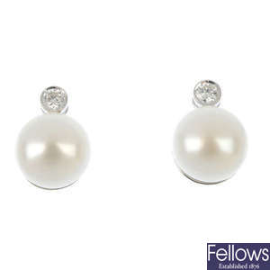 A pair of 18ct gold cultured pearl and diamond ear studs. 
