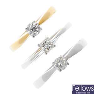 A selection of three 18ct gold diamond single-stone rings.