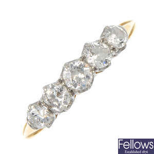 A mid 20th century platinum and 18ct gold diamond five-stone ring. 