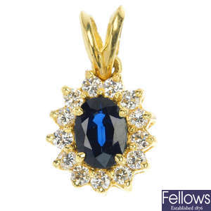 An 18ct gold sapphire and diamond pendant.