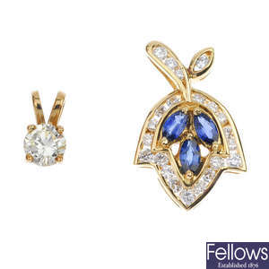 Two gem-set pendants. 