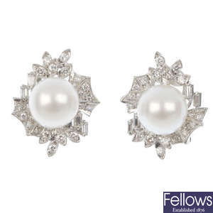 A pair of mid 20th century cultured pearl and diamond earrings.