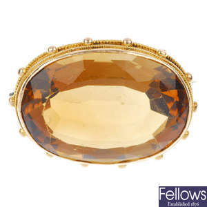 A late 19th century gold citrine brooch.