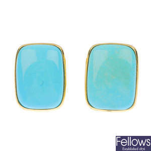 A pair of larimar single-stone ear clips.
