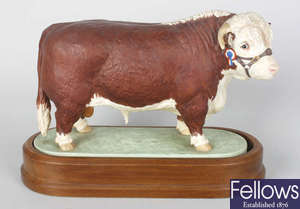 A Royal Worcester bone china limited edition study of a bull modelled by Doris Lindner